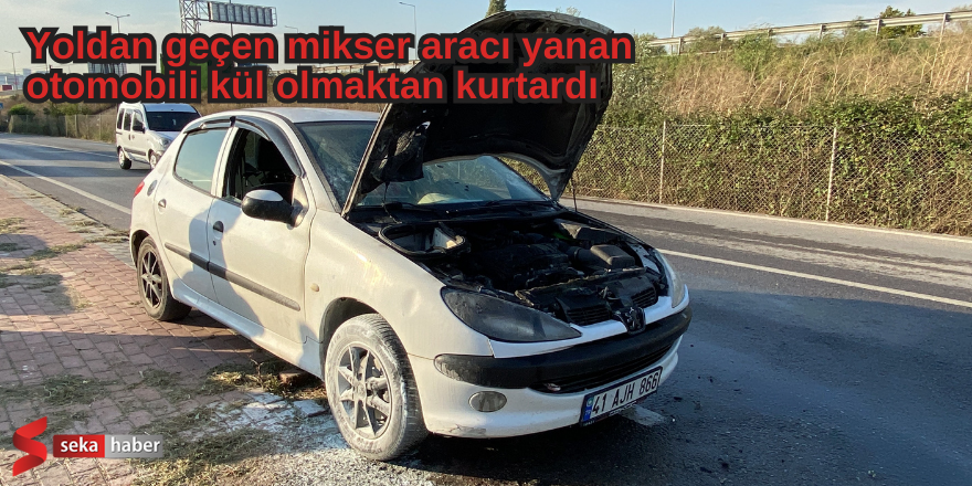 Yoldan geçen mikser aracı yanan otomobili kül olmaktan kurtardı